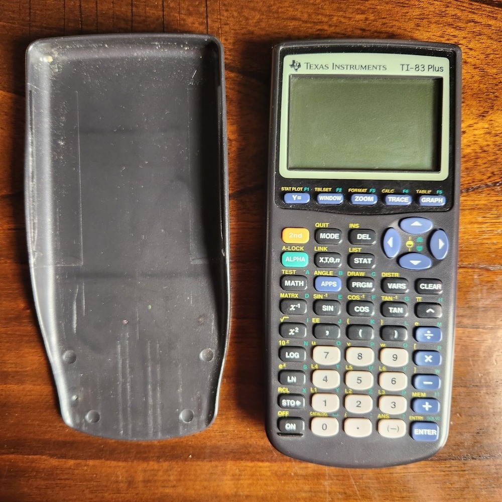 TEXAS INSTRUMENTS TI 83 PLUS GRAPHING CALCULATOR BLACK. WORKING